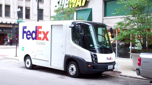 mo farah alberto salazar media handling FedEx truck.