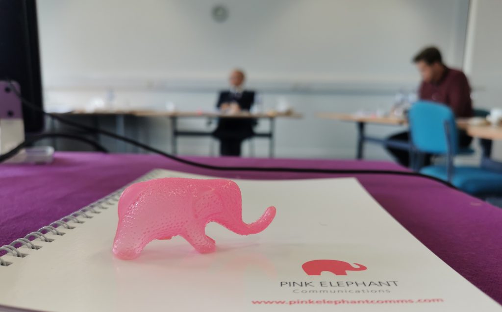 Advanced presentation skills Glasgow, pink elephant on notebook