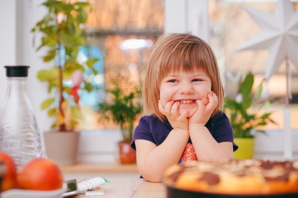 Assertiveness training Glasgow, child laughs at dinner table