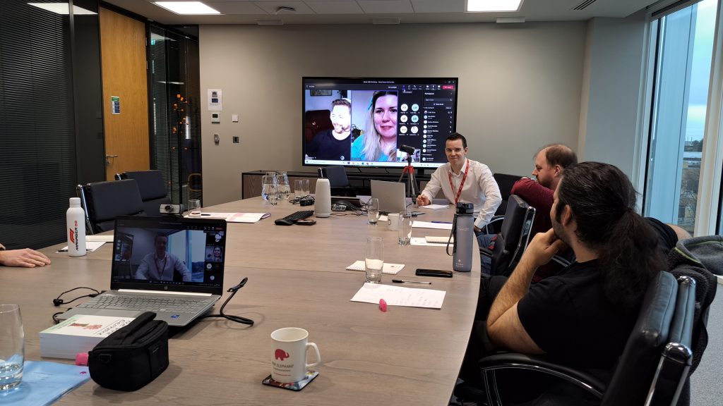 london presentation skills, andrew mcfarlan sits at a table