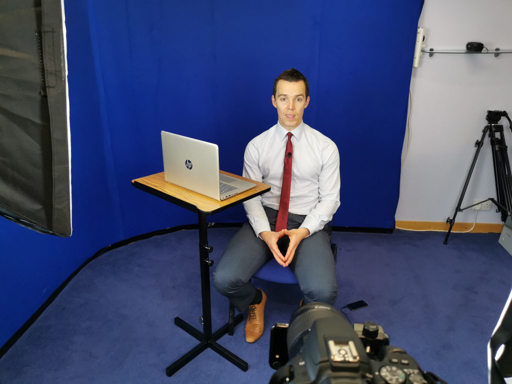 five most common interview questions and how to answer them, andrew mcfarlan sits on chair