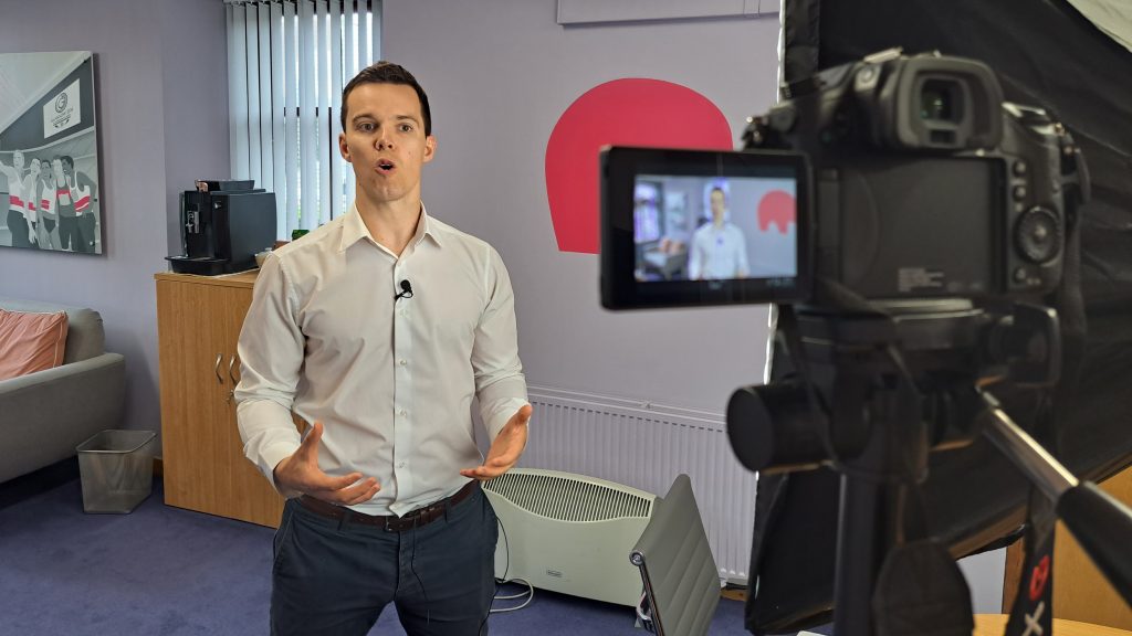 voice training scotland, andrew mcfarlan stands in front of camera
